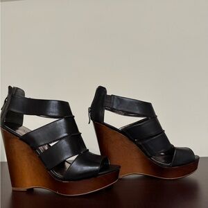 Barely worn  5 inch wedge heels.  Dark brown.